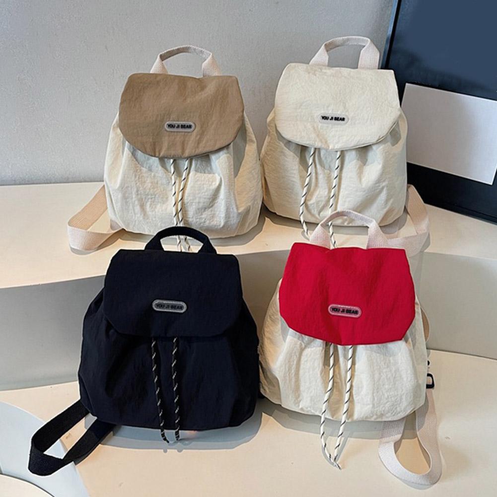 女性用ナイロンバックパック 軽量韓国風スクールバックパック  - Canvas Backpack Casual のレビューと価格
